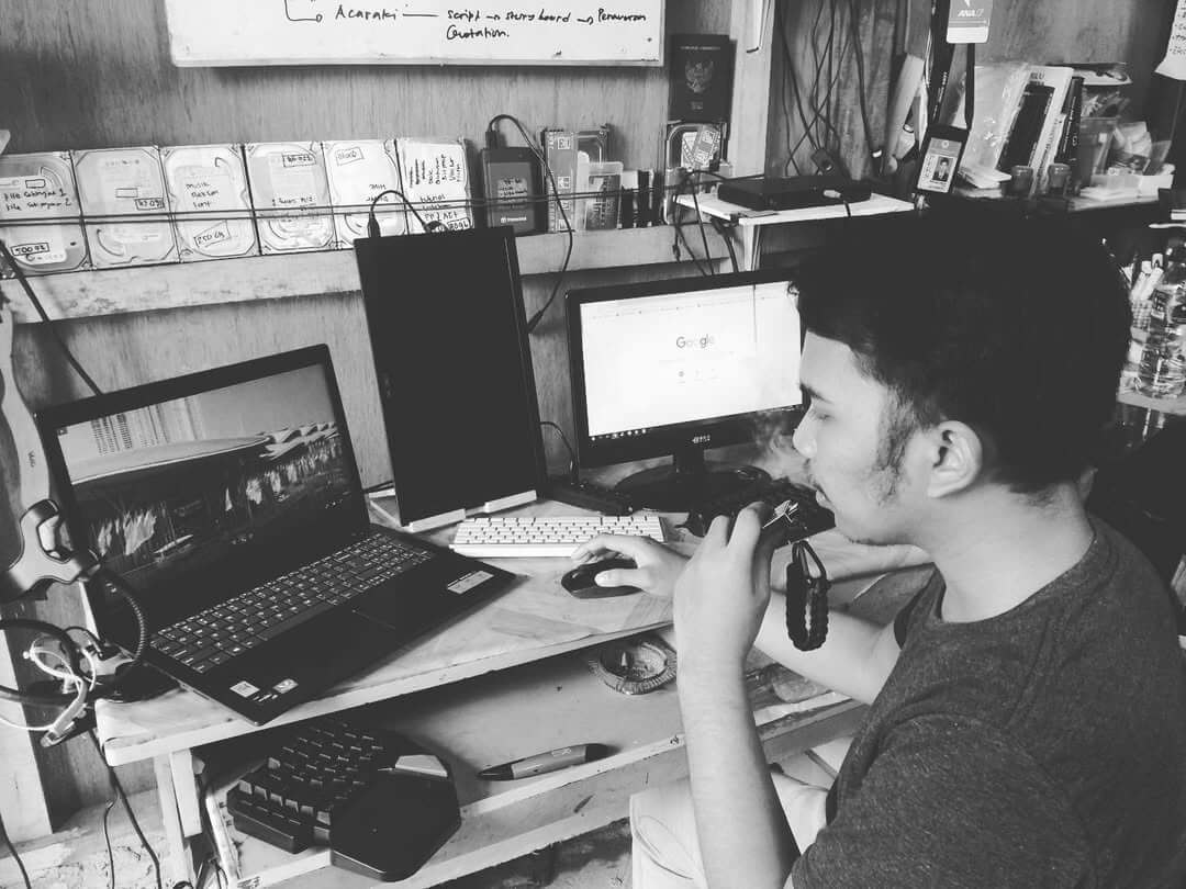 Mohamad Katavi with Computer